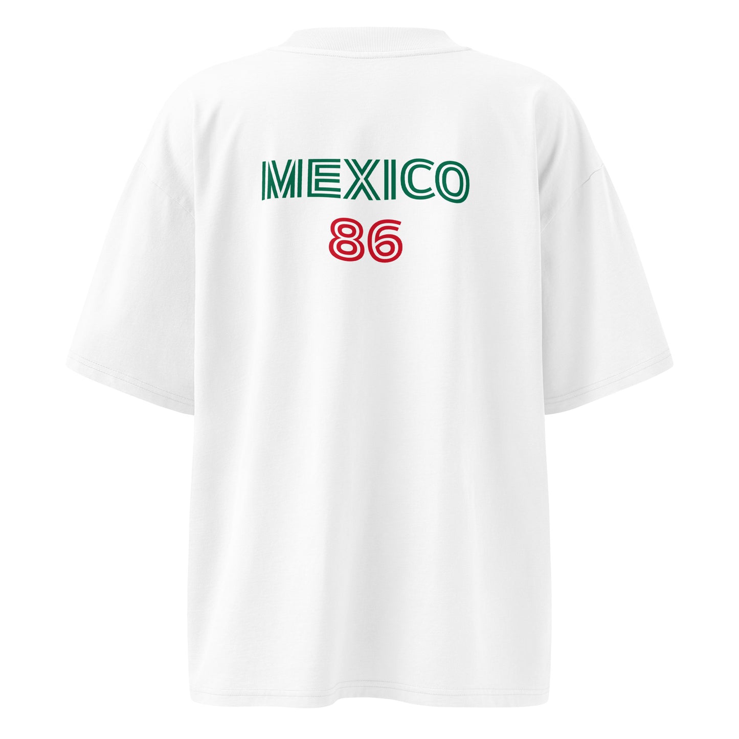 White short-sleeve t-shirt shown from the back, featuring 'MEXICO' printed in green and '86' printed in red on the upper back.