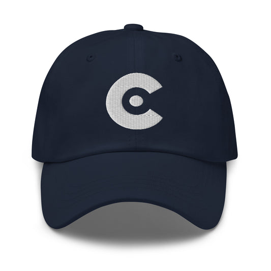 Navy cap with a cat embroidered on a white background